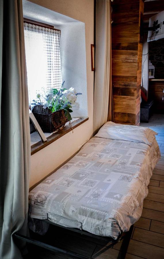 Chalet In Pietra E Legno Con Caminetto Inverso Pinasca Bagian luar foto